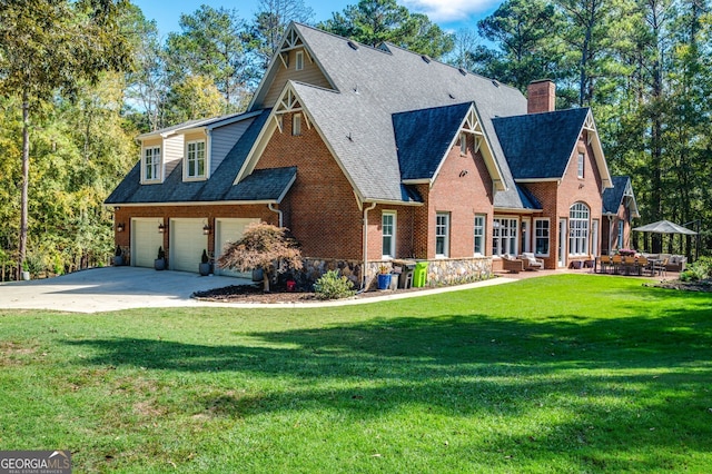 222 Valley View Dr, Rockmart, GA 30153 - view of front of property with a shingled roof, an outdoor living space, a chimney, concrete driveway, and an attached garage