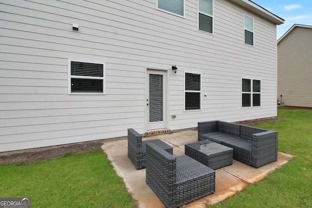 back of property featuring a yard and a patio area