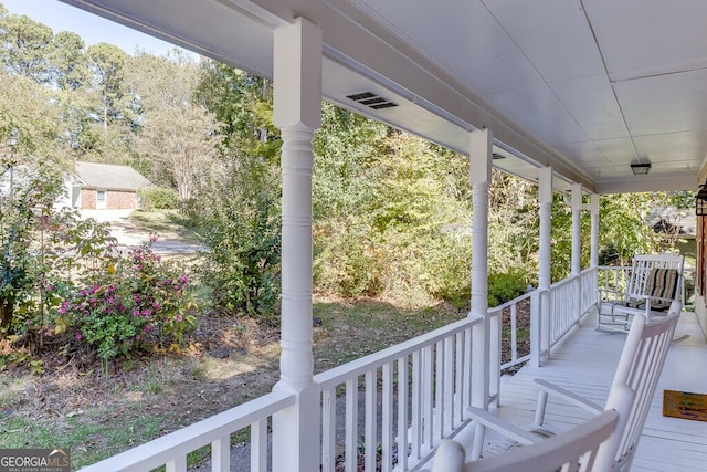 deck featuring covered porch