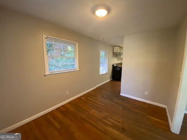 interior space with dark hardwood / wood-style flooring