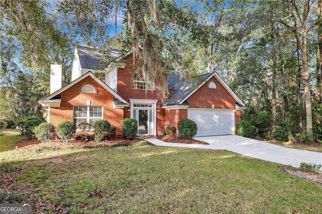 front facade with a front yard and a garage