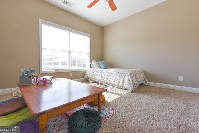 bedroom with ceiling fan, carpet floors, and vaulted ceiling