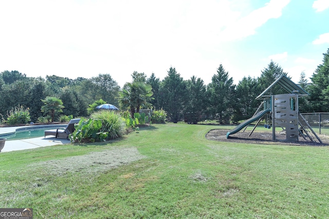 view of yard with a playground