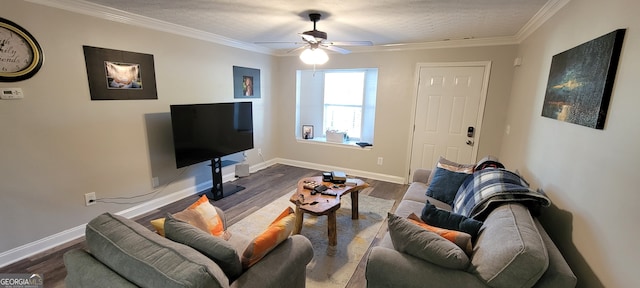 living room with dark wood-type flooring, crown molding, a textured ceiling, and ceiling fan