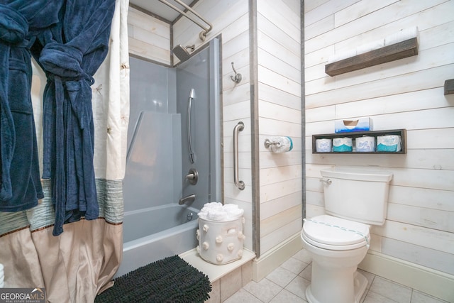 bathroom with toilet, wood walls, shower / tub combo with curtain, and tile patterned floors