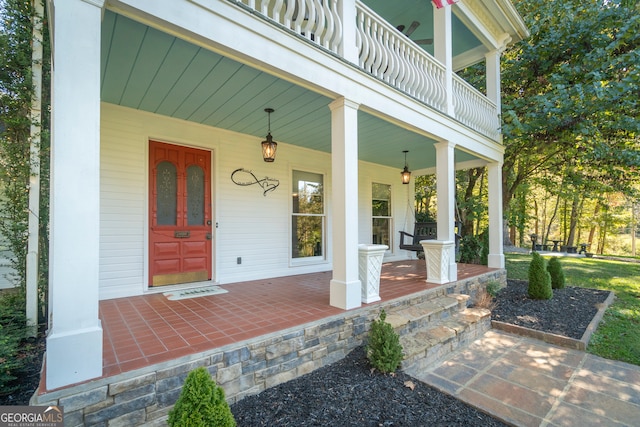 entrance to property featuring covered porch