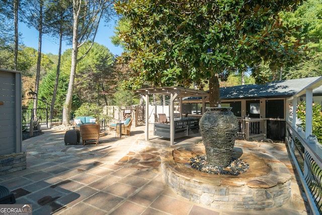 view of patio featuring a pergola