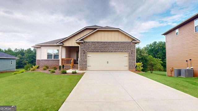 craftsman-style home featuring a front yard and a garage