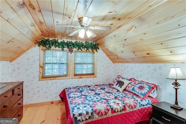 bedroom with light hardwood / wood-style floors, lofted ceiling, wood ceiling, and ceiling fan