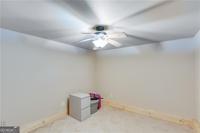 spare room with ceiling fan