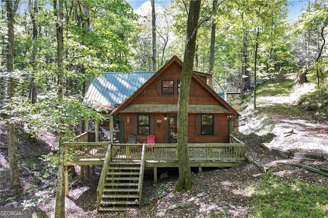 exterior space featuring a wooden deck