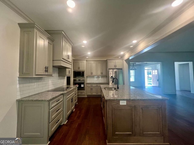 kitchen featuring black appliances, crown molding, light stone counters, and dark hardwood / wood-style floors