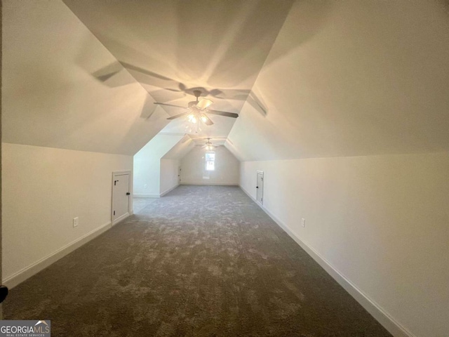 additional living space featuring ceiling fan, carpet flooring, and vaulted ceiling