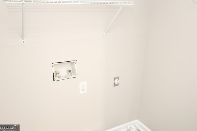 clothes washing area featuring hookup for an electric dryer and washer hookup