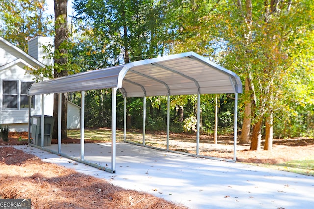 view of vehicle parking featuring a carport