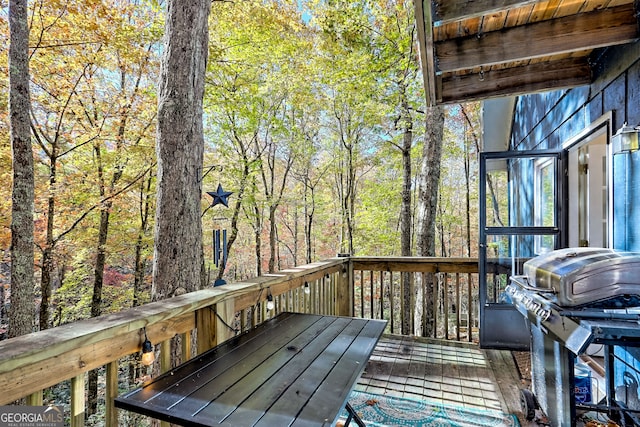 wooden deck with area for grilling