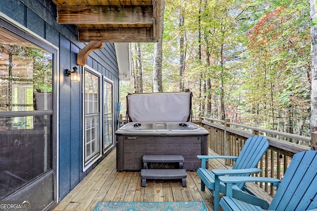 deck featuring a hot tub