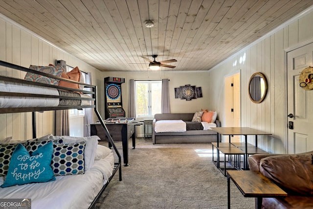 interior space featuring wood walls, crown molding, and wooden ceiling