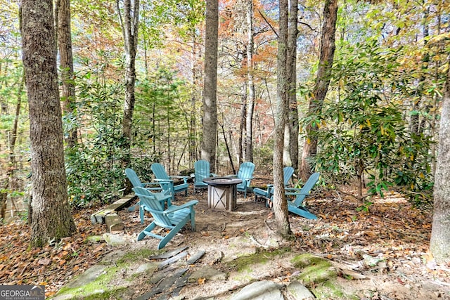 view of patio / terrace featuring a fire pit