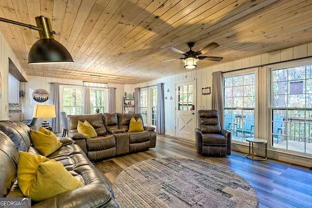 living room featuring french doors, wood ceiling, hardwood / wood-style flooring, and a wealth of natural light