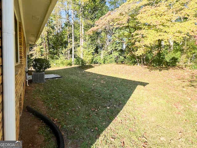 view of yard featuring central AC