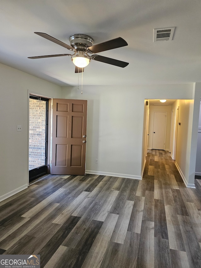 entrance foyer with ceiling fan and dark hardwood / wood-style floors