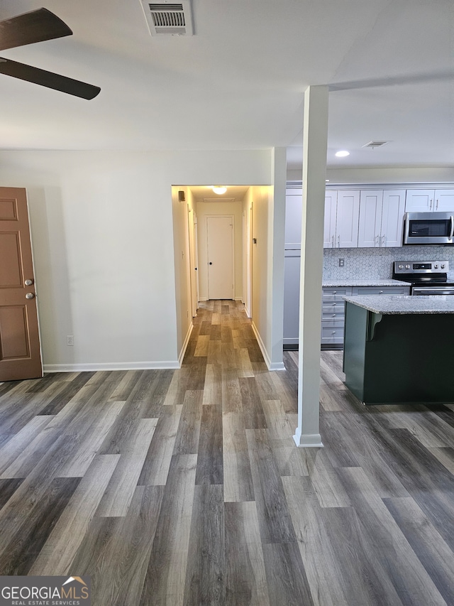 hall featuring dark wood-type flooring