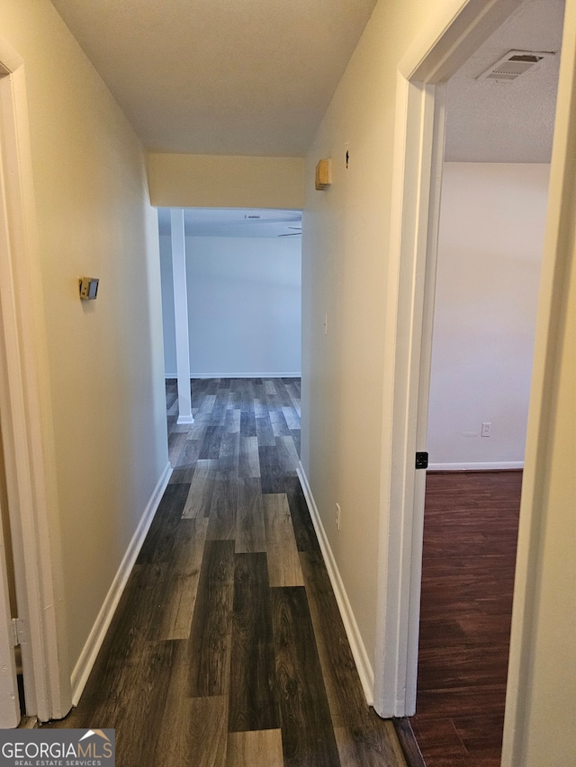 hall featuring dark hardwood / wood-style floors