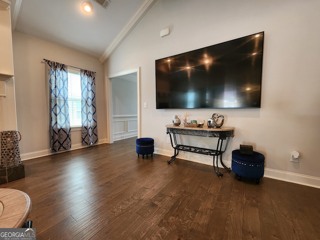 living room featuring crown molding, vaulted ceiling, and dark hardwood / wood-style flooring