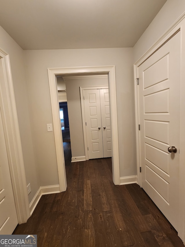 hall featuring dark wood-type flooring