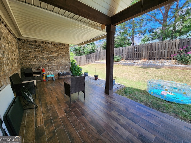 view of patio with a wooden deck