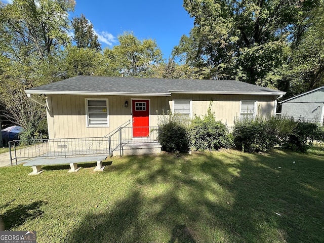 view of front of home with a front yard