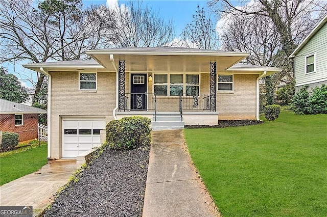 view of front of home featuring a front yard, a porch, and a garage