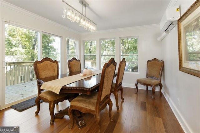 sunroom with a chandelier and a wall mounted air conditioner