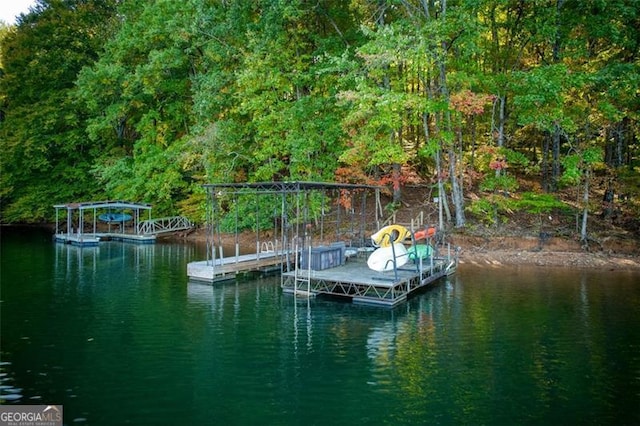 view of dock with a water view