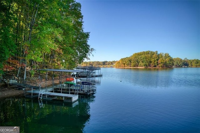 dock area featuring a water view