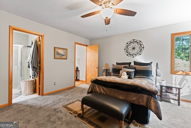 carpeted bedroom featuring ensuite bath and ceiling fan