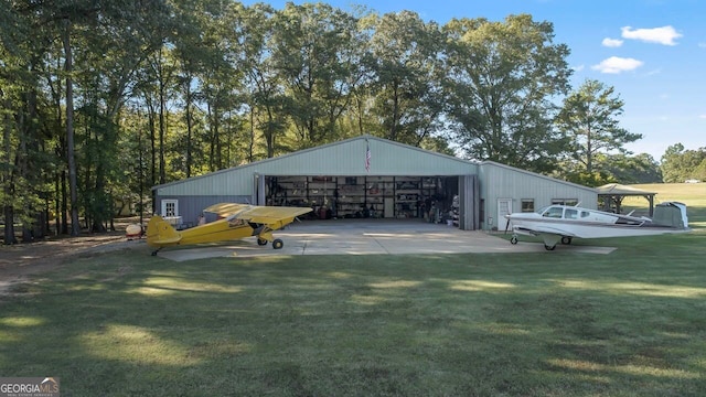 view of outdoor structure featuring a yard