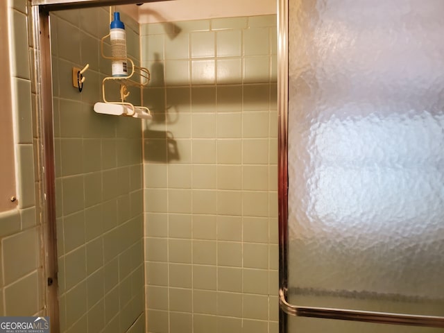 bathroom featuring walk in shower