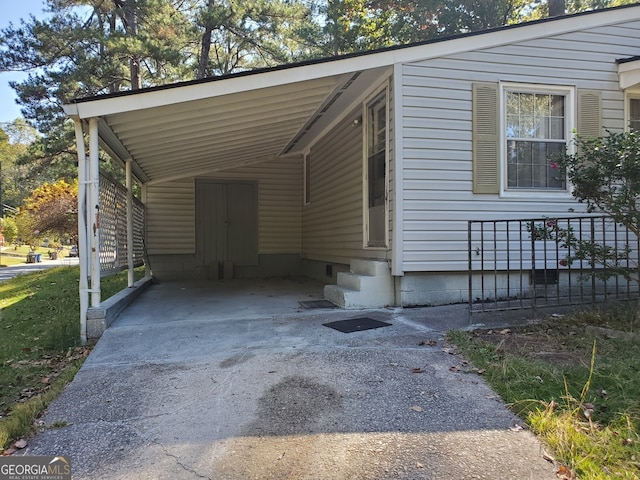 view of home's exterior with a carport