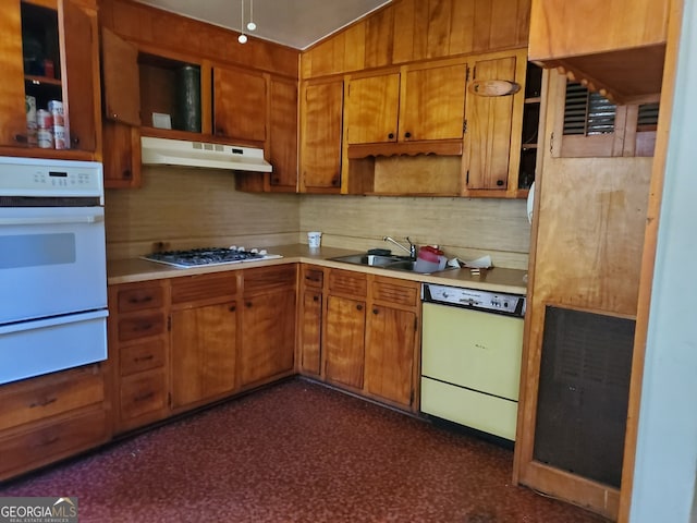 kitchen featuring sink, dishwasher, decorative backsplash, and stainless steel gas stovetop