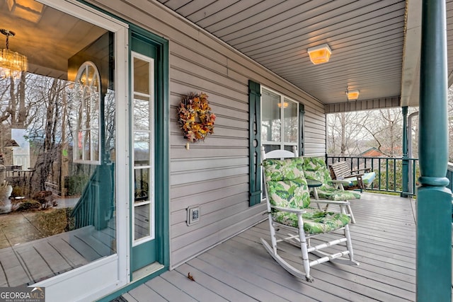 wooden terrace with covered porch