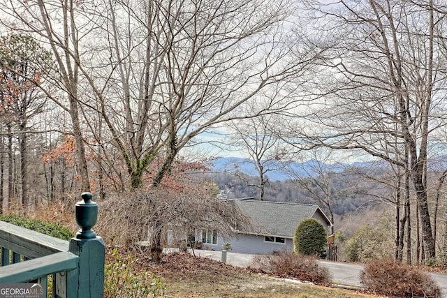 view of home's exterior featuring a mountain view