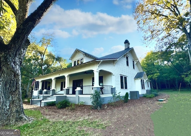 view of front of house featuring covered porch and central AC unit