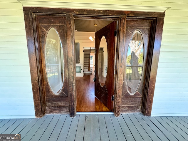 doorway to property with a wooden deck