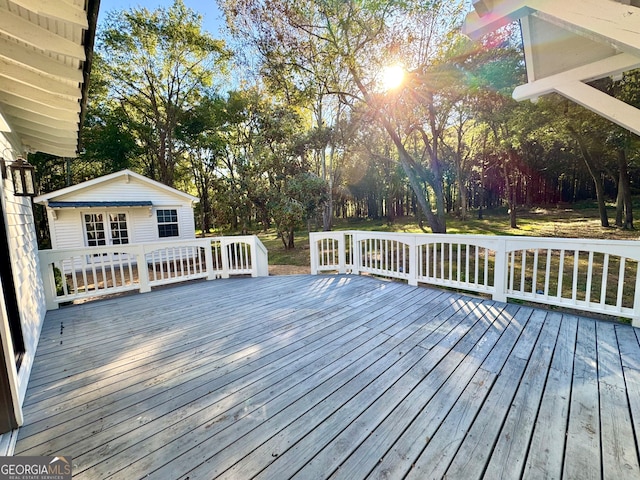 deck featuring an outdoor structure