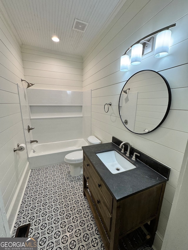 full bathroom featuring vanity, wood walls, toilet, and shower / bathtub combination