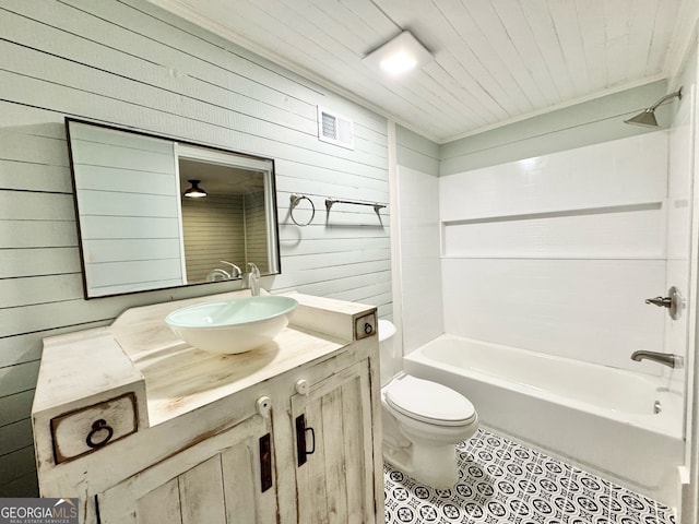 full bathroom featuring shower / bathing tub combination, wooden ceiling, toilet, wood walls, and vanity