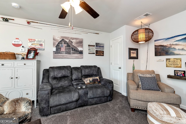 carpeted living room with ceiling fan