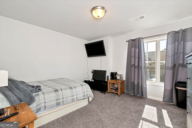 bedroom featuring carpet